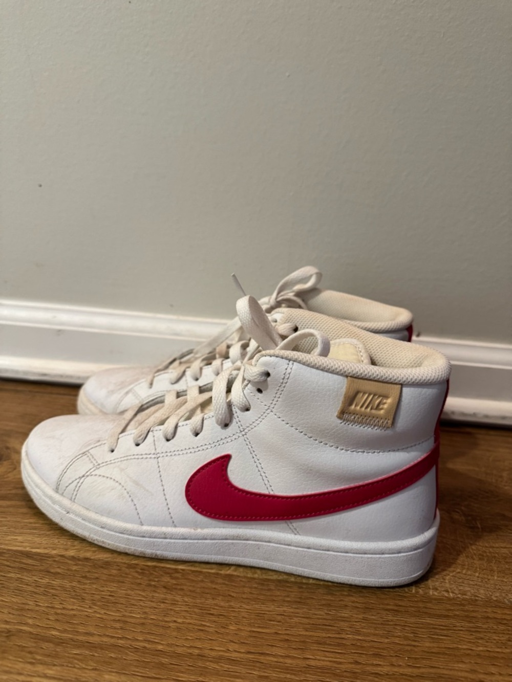 Nike Kids White High-Top Sneakers with Pink Swoosh Accent